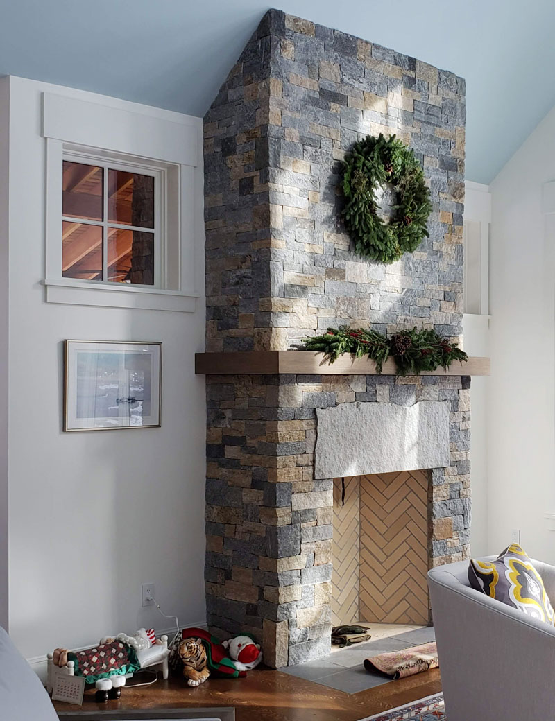 Fireplace in sunlit room