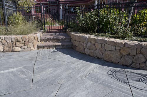 Pool patio, stone wall, bluestone steps